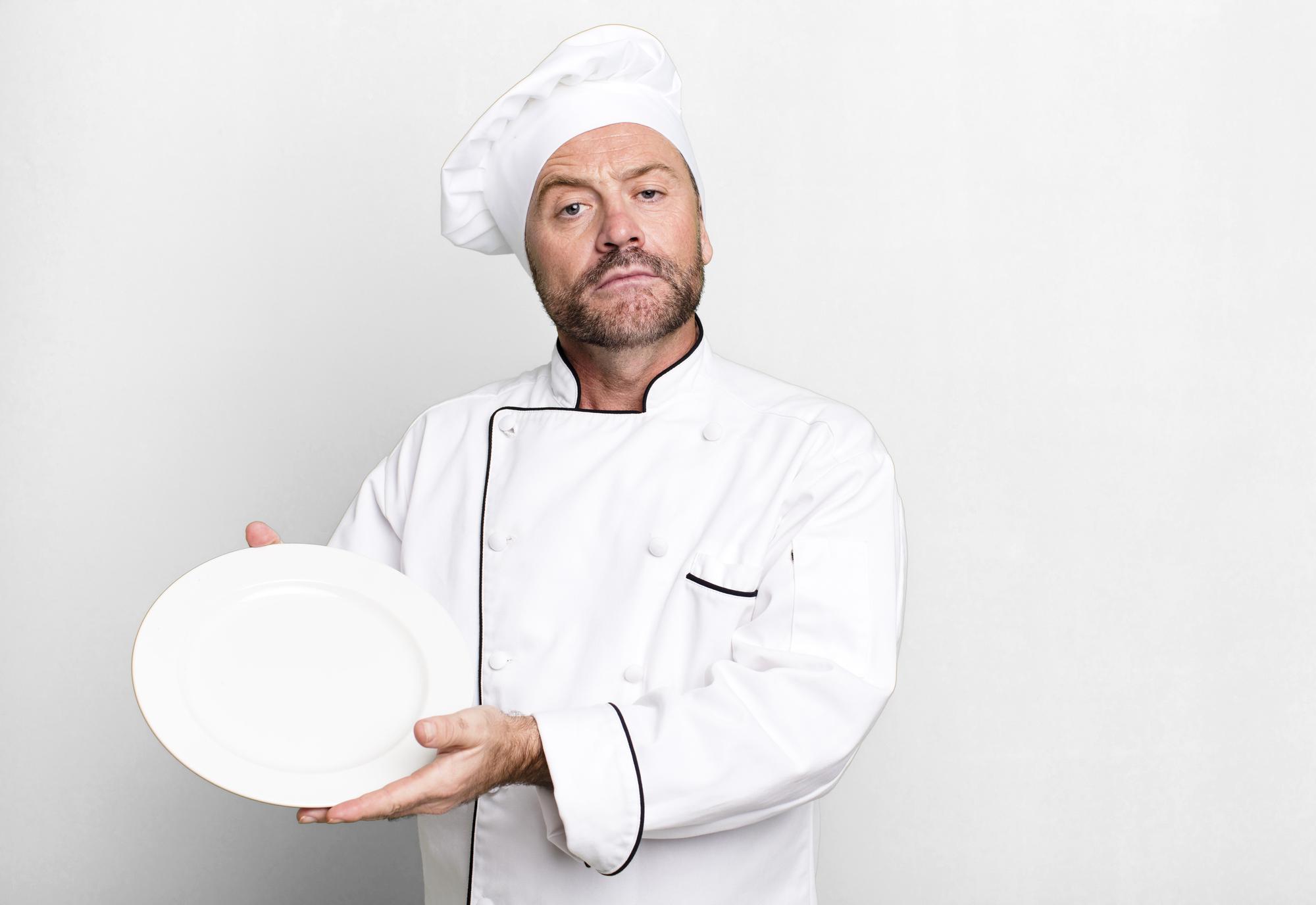 Portrait of the founder arranging a plate