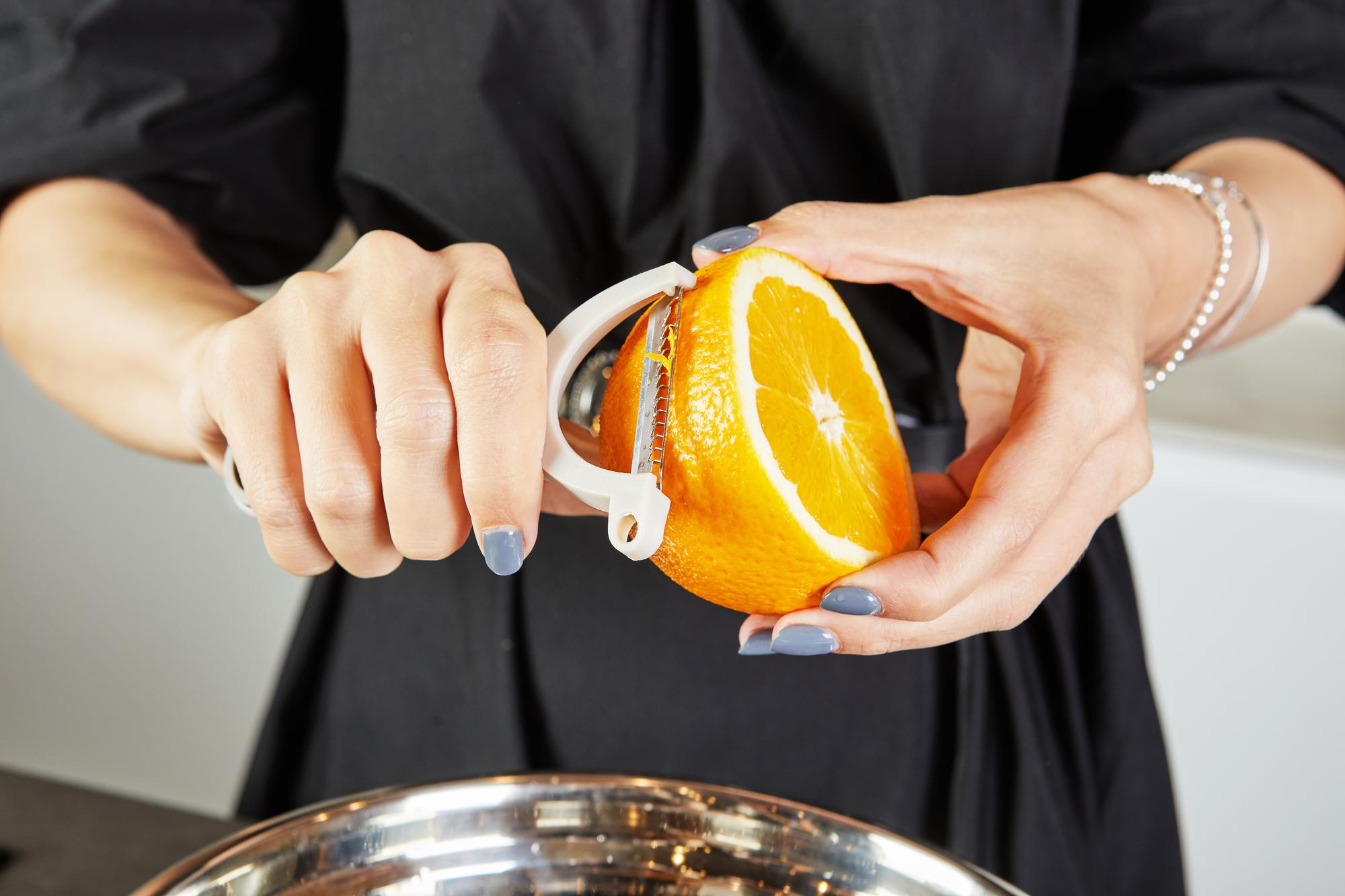 Close-up on hands using microplane
